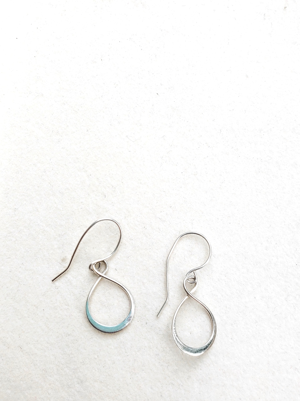 Sterling Silver Teardrop Loop Earrings - Light Blue Accent